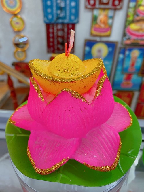 Đèn cầy sen Thần Tài